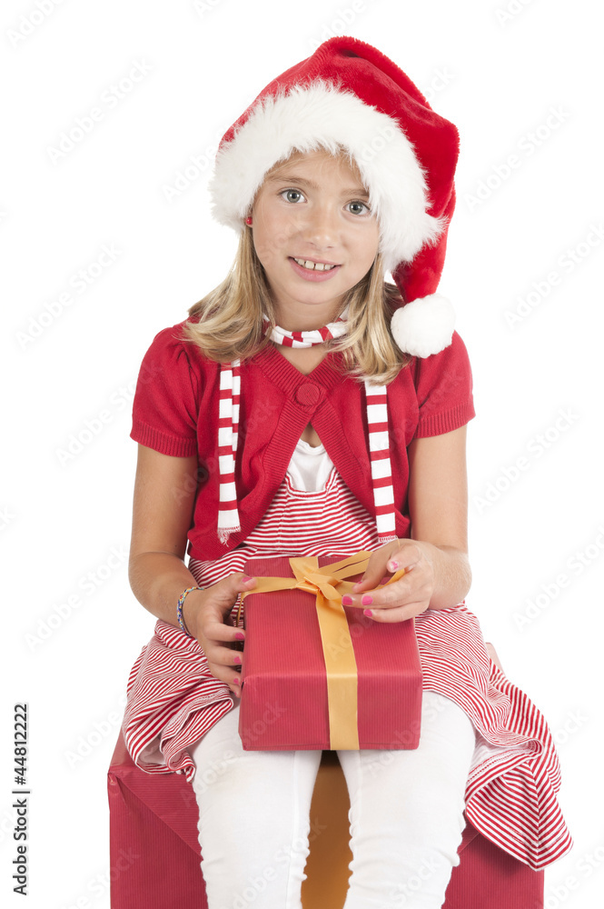 girl with christmas hat and present on white girl with christmas hat and present on white