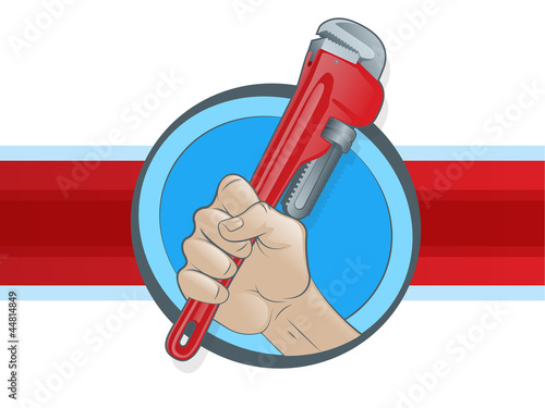 Plumber's Hand Grasping a Pipe Wrench photo