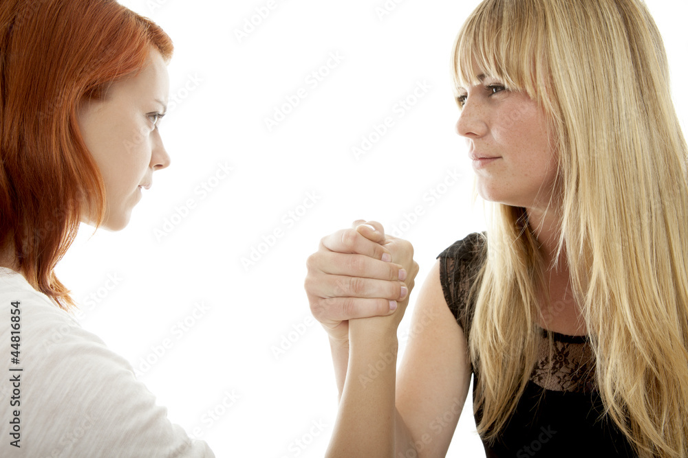 beautiful red and blond haired girls concept power with arms beautiful red and blond haired girls concept power with arms