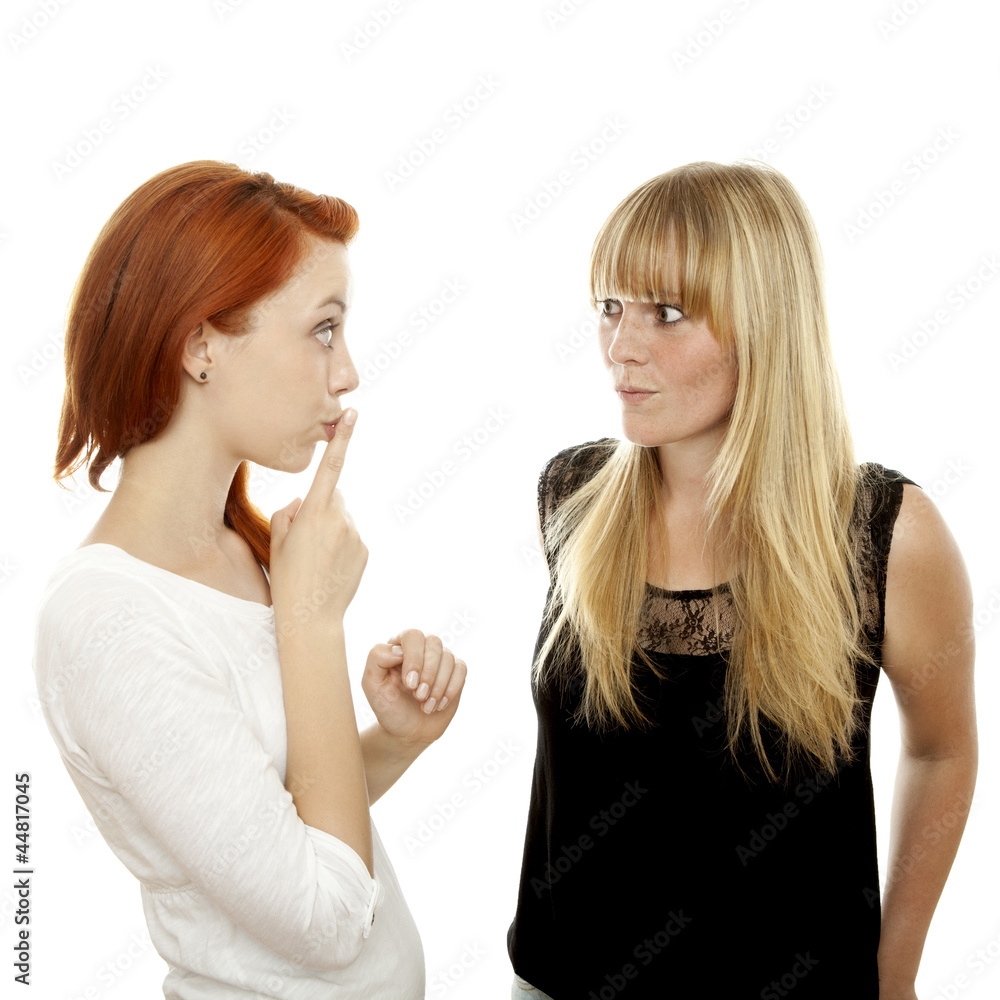 beautiful red and blond haired girls with finger on mouth secret beautiful red and blond haired girls with finger on mouth secret