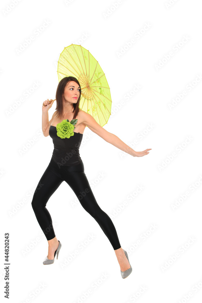 Young women holding a green umbrella Young women holding a green umbrella