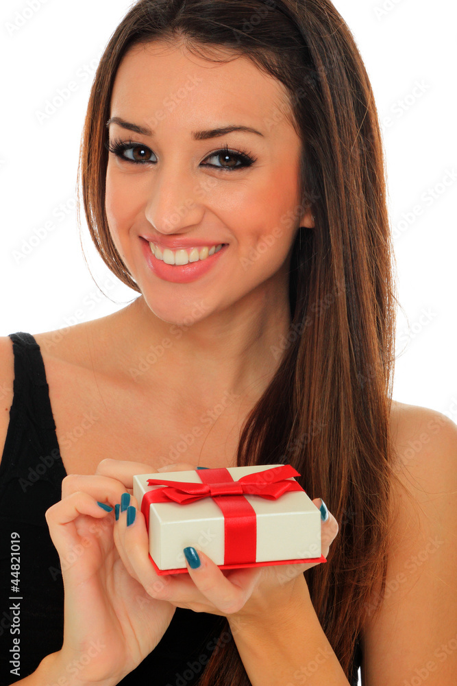 woman in black dress holding a gift box woman in black dress holding a gift box