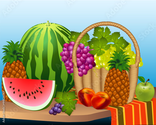 Fototapeta Naklejka Na Ścianę i Meble -  basket and fruits watermelon grape peaches, pineapple