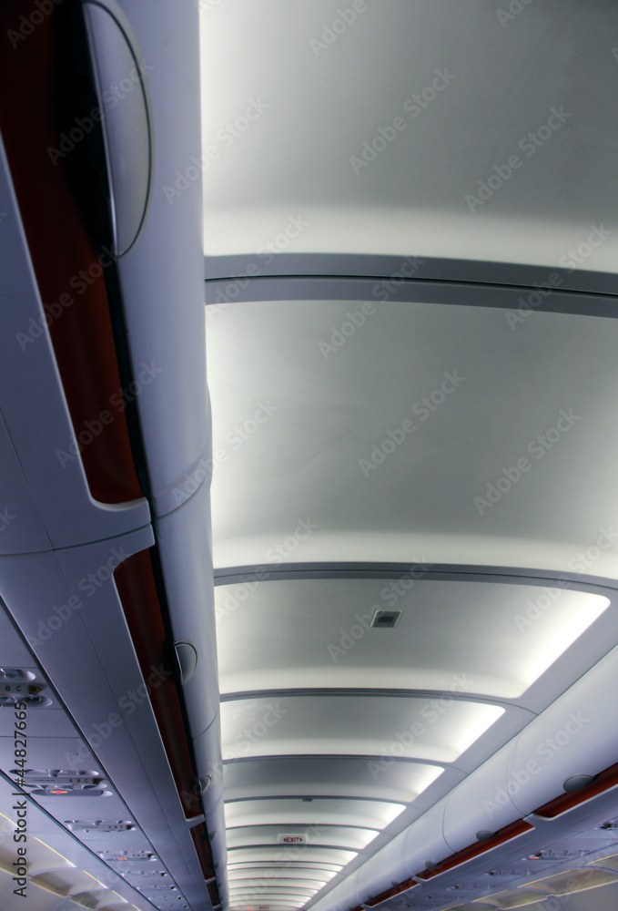 Fototapeta premium the plane corridor ceiling inside