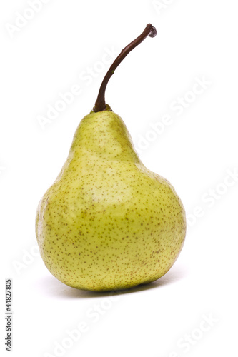 green pear on white