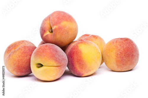 tasty peaches on white