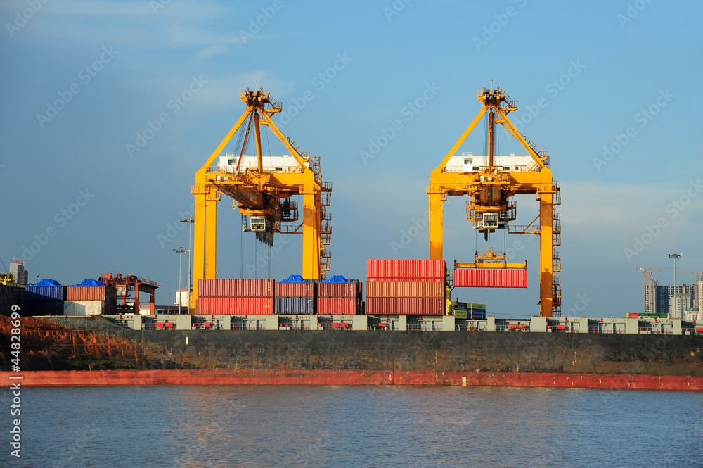 Fototapeta premium Containers loading at sea trading port