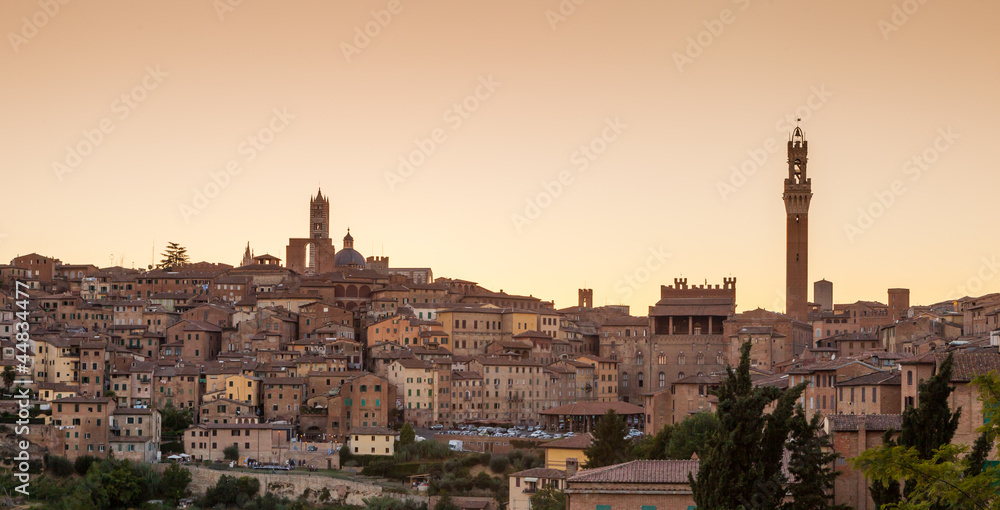 Cityscape of Siena at sunset, Siena, Tuscany, Italy