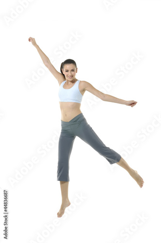 excited young girl in jumping posture