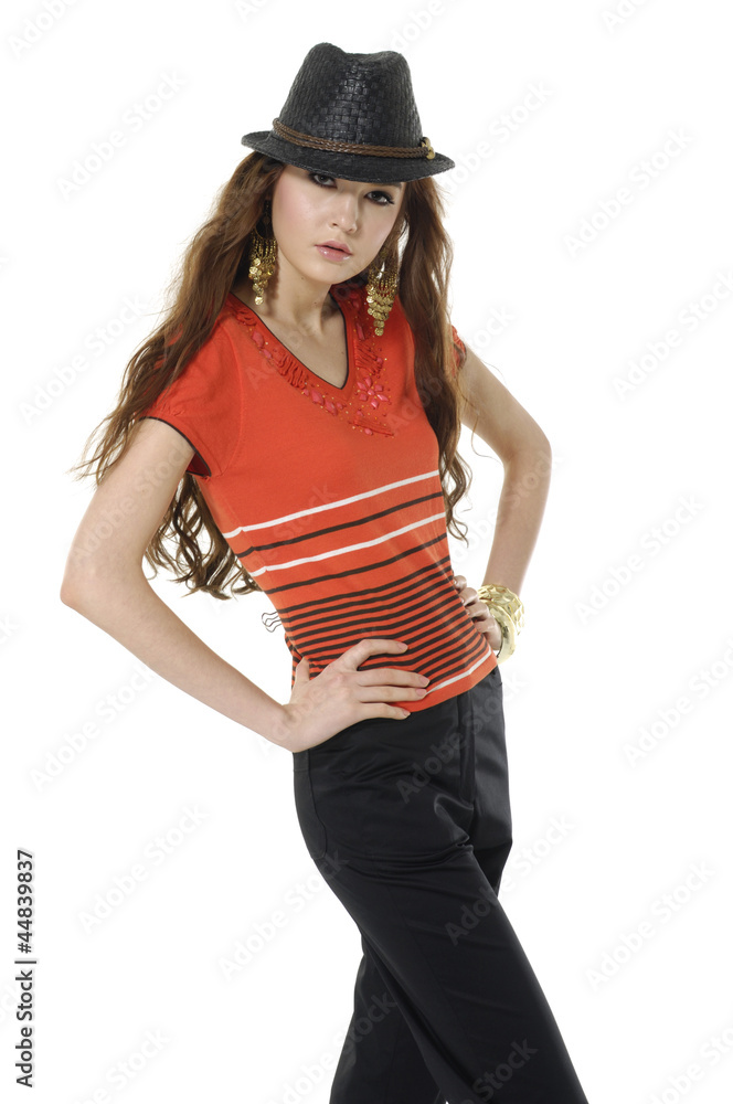 Attractive young fashion model posing in the studio Attractive young fashion model posing in the studio