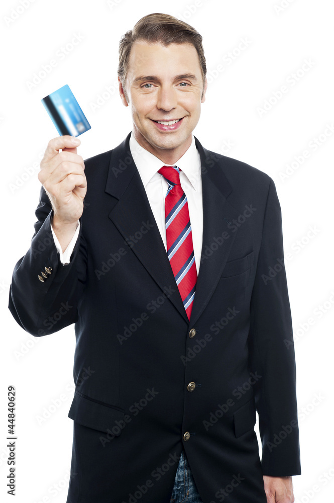 An entrepreneur showing debit card to camera An entrepreneur showing debit card to camera