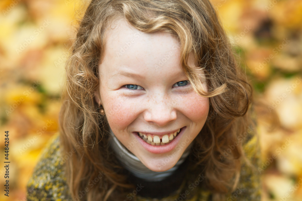 Outdoor high angle portrait of smiling blond girl Outdoor high angle portrait of smiling blond girl