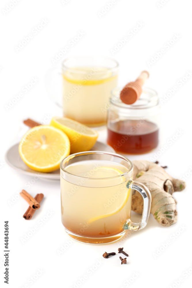 Ginger tea with honey, lemon, cinnamon and cloves Ginger tea with honey, lemon, cinnamon and cloves
