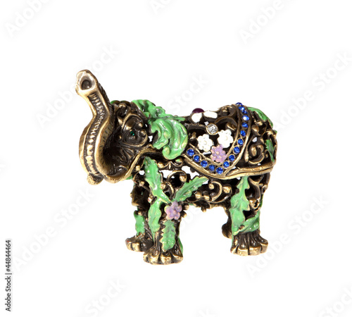 Metal elephant with crystals on the white background  souvenir 
