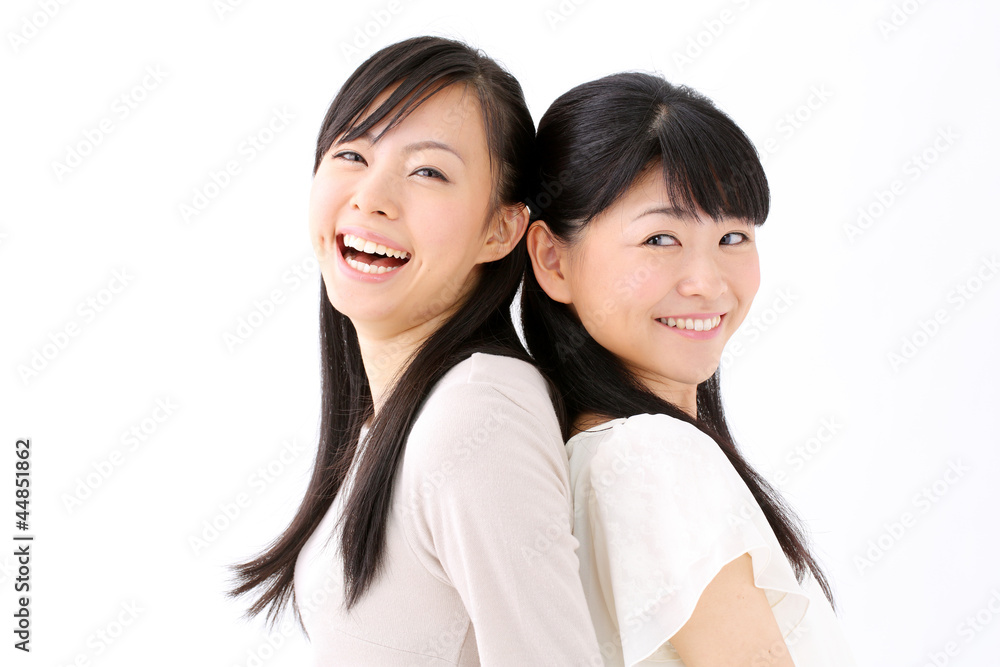 女性二人 背中合わせ Stock 写真 Adobe Stock