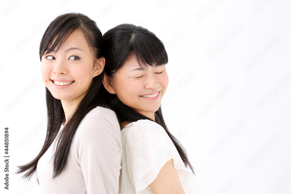 女性二人・背中合わせ 女性二人・背中合わせ