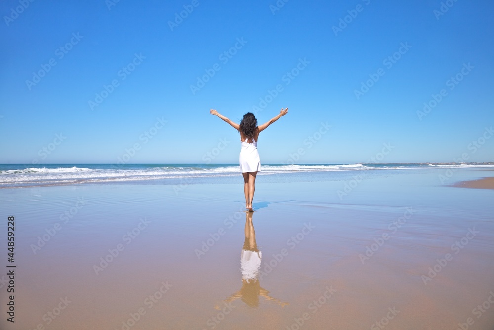 woman greeting sea at Castilnovo beach