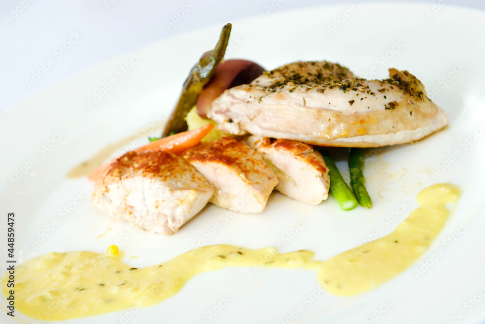Grilled chicken breast with vegetables and cream sauce Grilled chicken breast with vegetables and cream sauce