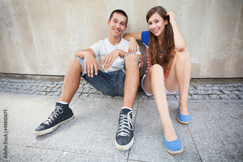 Teenage couple smiling