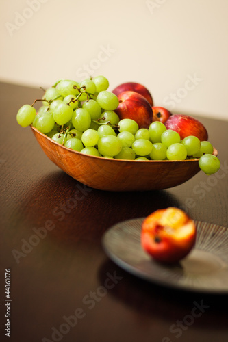 Healthy grapes and geengage in bowl