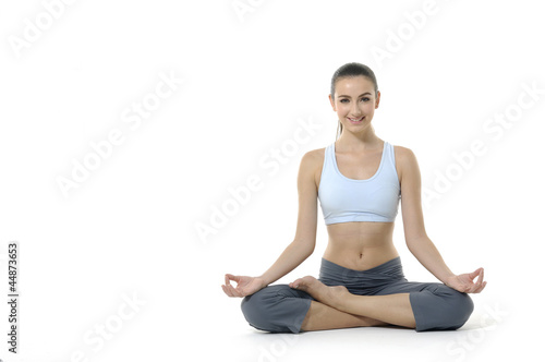 woman's hand resting on her knee with fingers in yoga