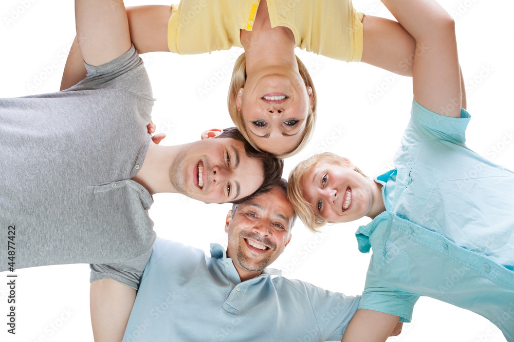 Happy family looking down