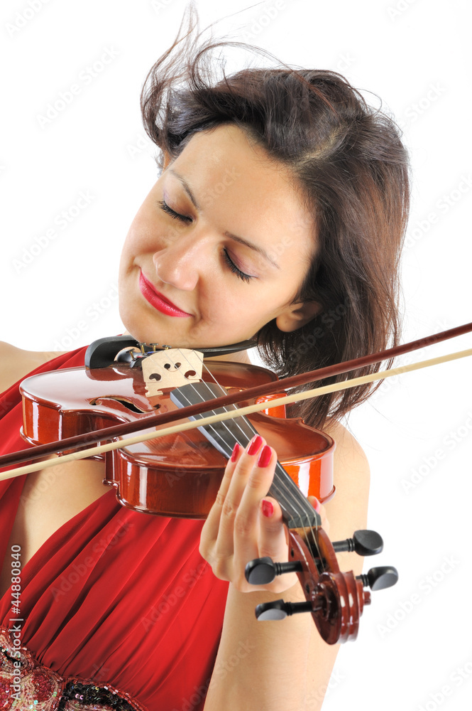 Beutiful musician playing violin isolated on white Beutiful musician playing violin isolated on white
