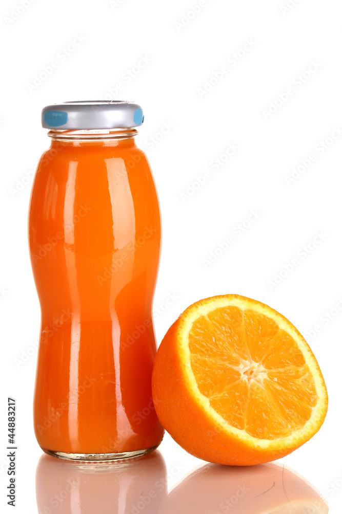 Delicious orange juice in a bottle and orange next to it Delicious orange juice in a bottle and orange next to it