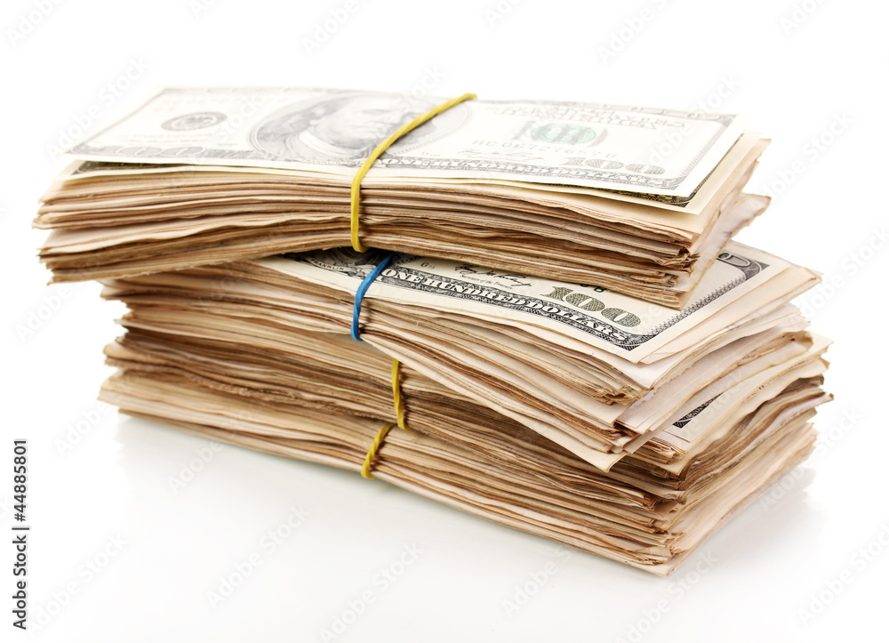 Stack of one hundred dollars banknotes close-up isolated Stack of one hundred dollars banknotes close-up isolated