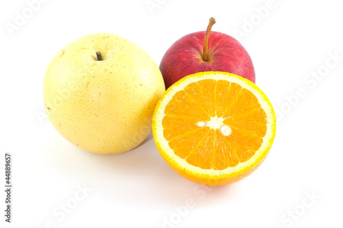 oranges and juicy apple isolated on white background