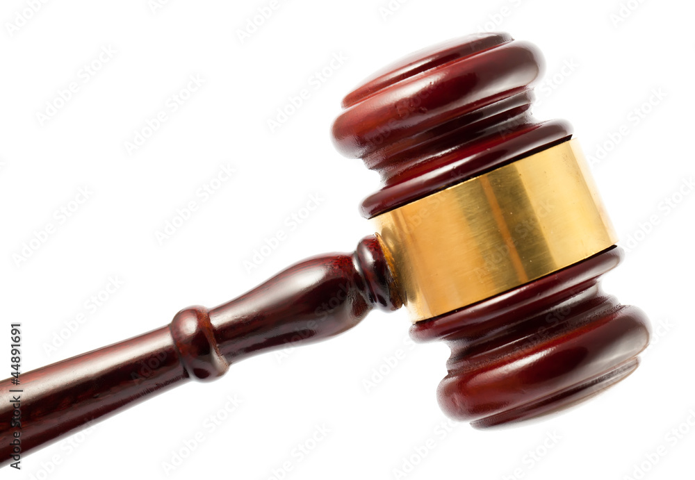 Wooden brown gavel closeup Wooden brown gavel closeup