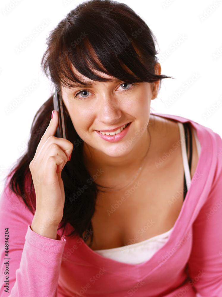 Pretty young woman talking on cell phone Pretty young woman talking on cell phone