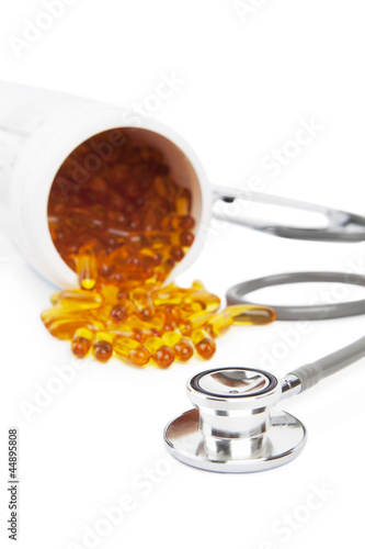 Fish oil with stethoscope photo