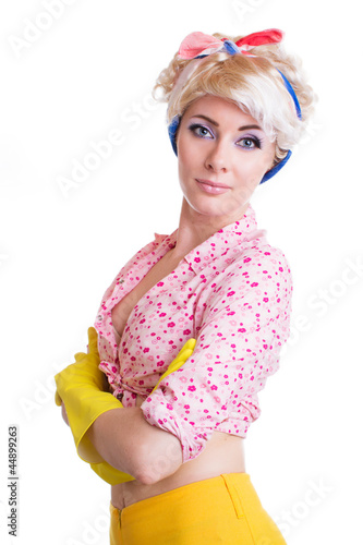 Pinup styled housewife in gloves