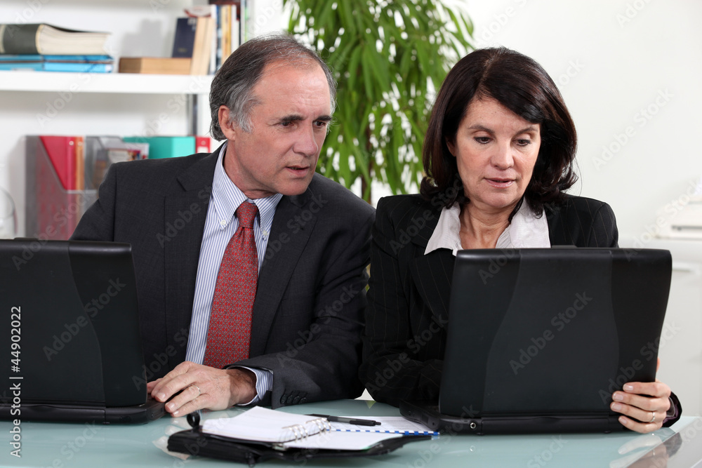Middle-aged business partners Middle-aged business partners