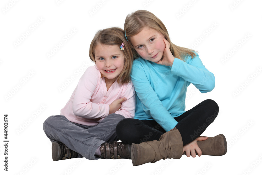 two little girls posing together two little girls posing together