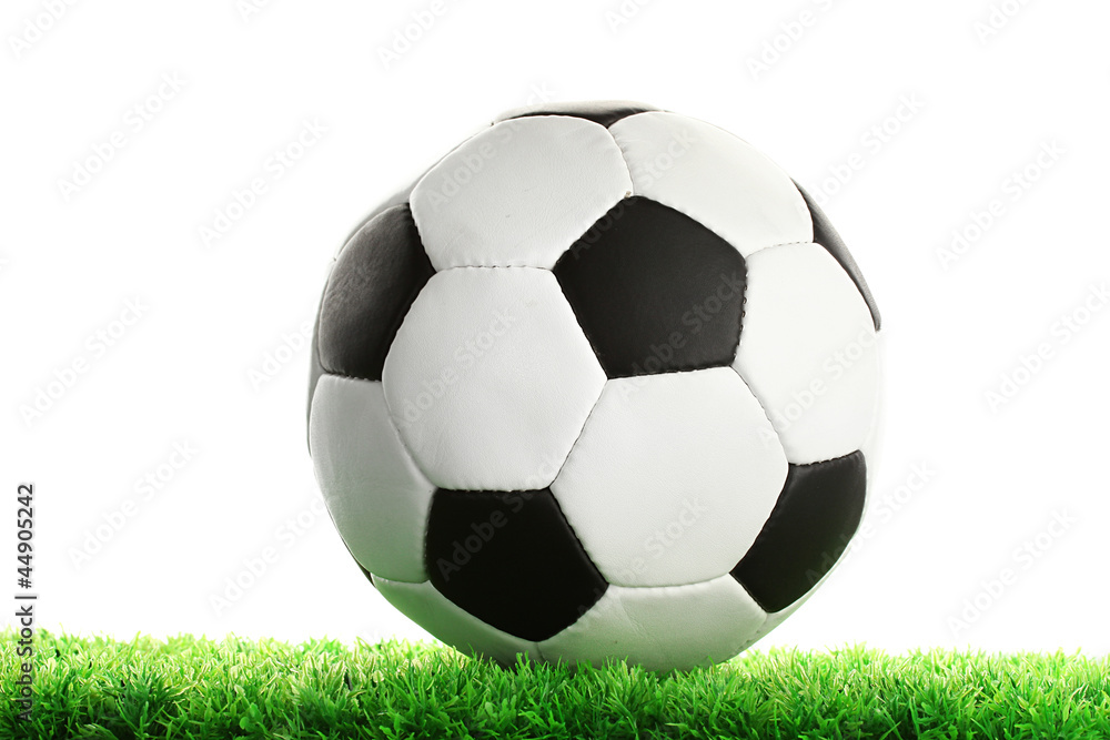 football ball on green grass, isolated on white football ball on green grass, isolated on white