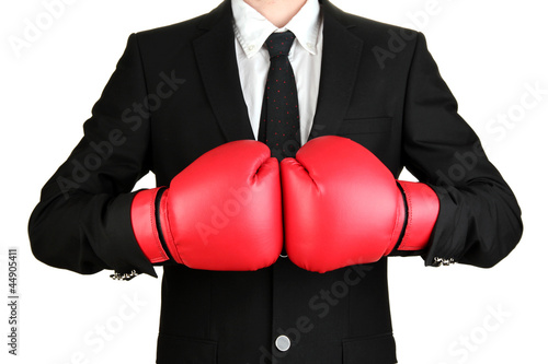 businessman in boxing gloves isolated on white © Africa Studio
