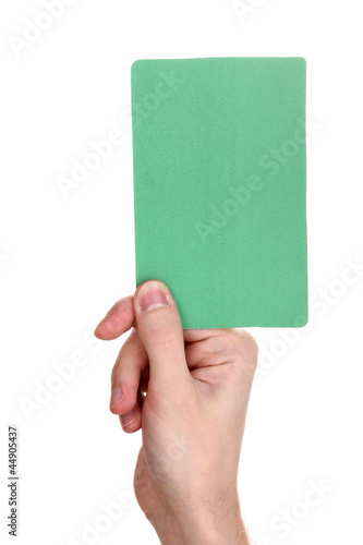 hand holding green card isolated on white
