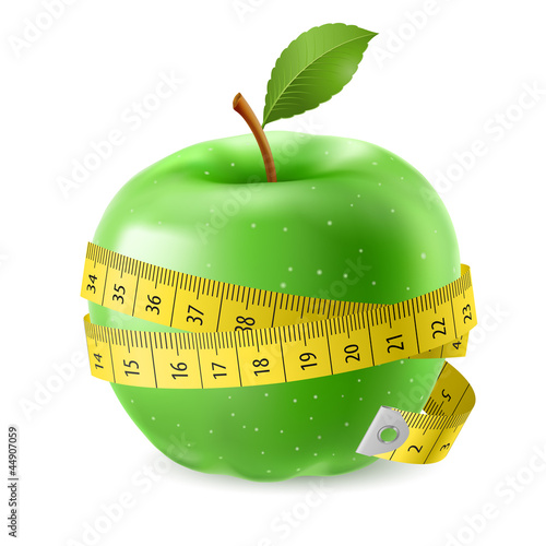 Green apple and measure tape