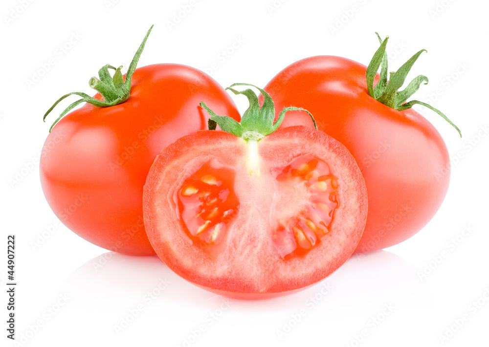 Two whole red tomatoes and one half Isolated on white background Two whole red tomatoes and one half Isolated on white background