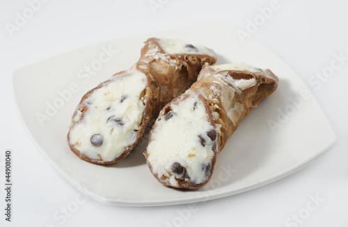Fotografie cannoli nel piatto