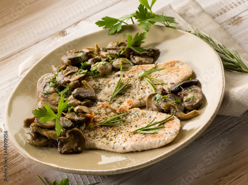 chicken fillet with sauteed mushroom photo