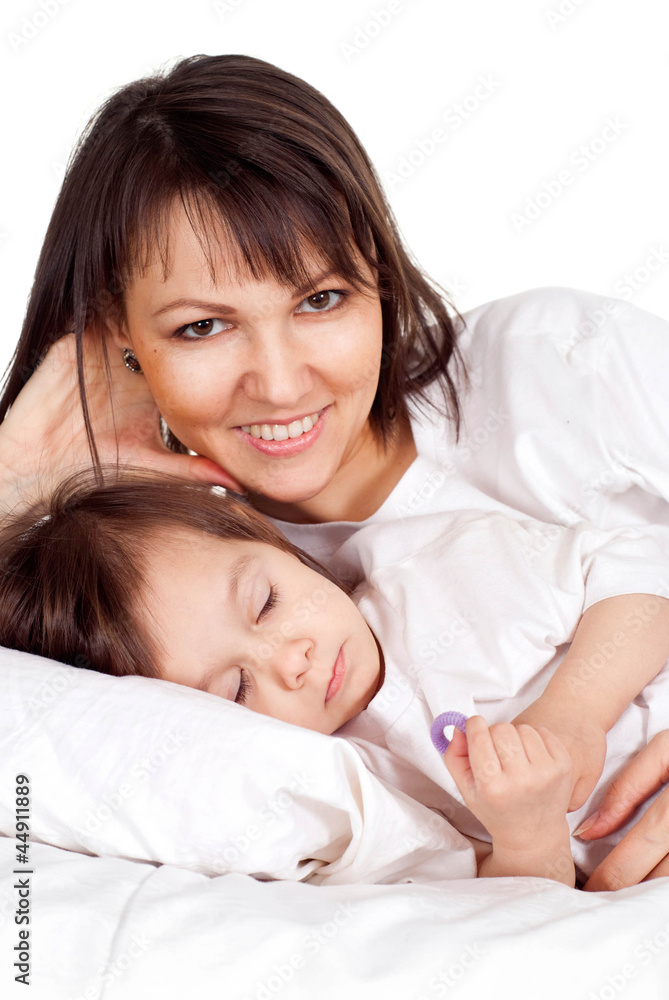 A beautiful good Caucasian mother with her daughter lying A beautiful good Caucasian mother with her daughter lying