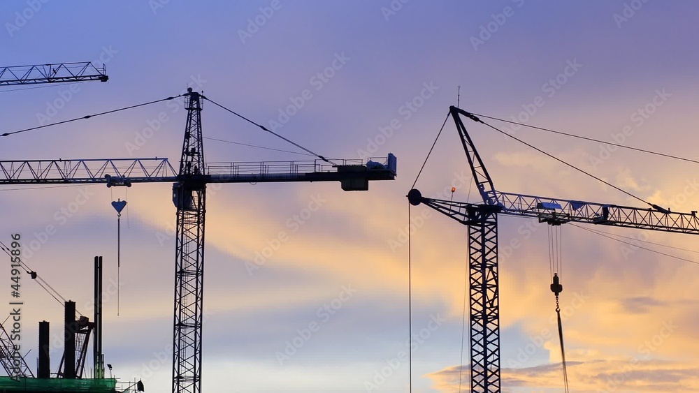 Construction work at sunset.