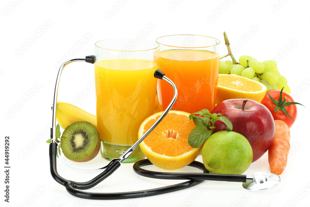 Healthy eating. Fruits, vegetables, juice and stethoscope Healthy eating. Fruits, vegetables, juice and stethoscope