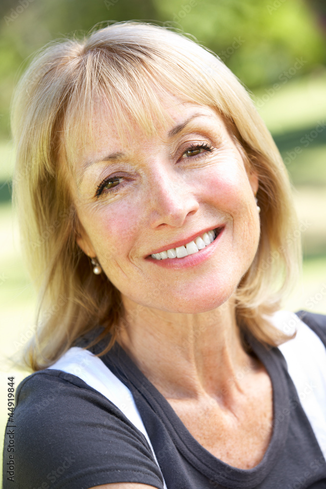 Outdoor Portrait Of Smiling Senior Woman Outdoor Portrait Of Smiling Senior Woman