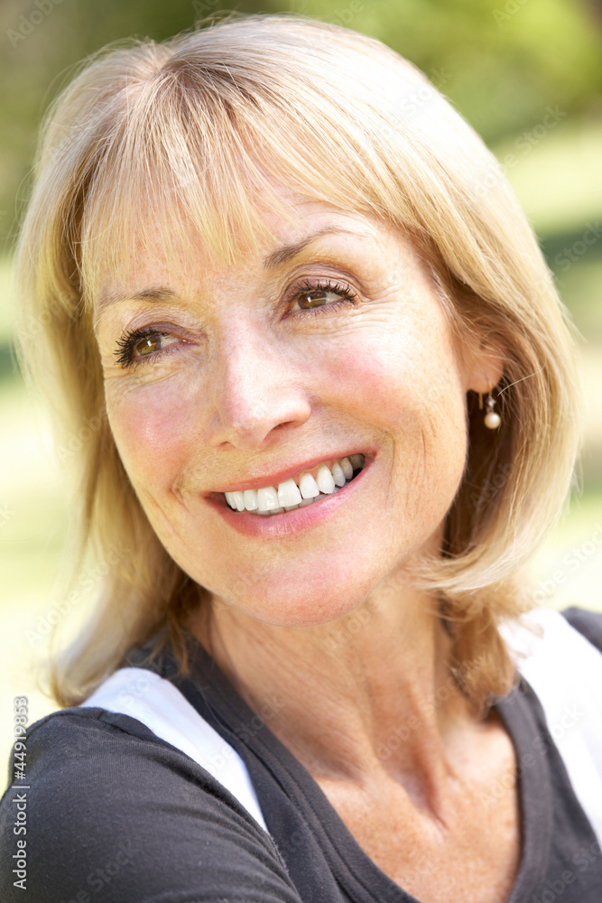 Outdoor Portrait Of Smiling Senior Woman Outdoor Portrait Of Smiling Senior Woman