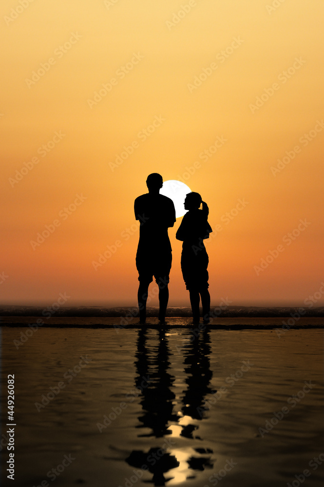 silhouette of couple in sunset