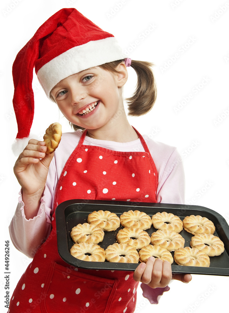 happy little girl baking Christmas cookies - white background happy little girl baking Christmas cookies - white background